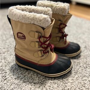 Sorel Tan and Black Snow Boots with Red Accents